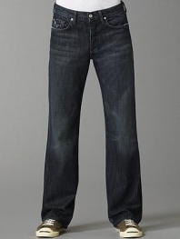 Soft Italian cotton denim in a dark blue denim with subtle fading and whiskering detail. Fading has a slight brown cast Straight-leg, relaxed fit Button fly Five-pocket style Slight distressing on pockets Signature squiggle stitching on back pockets Inseam, about 33¼ Machine wash Made in USA