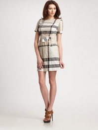 The iconic end-on-end windowpane check print meets a belted, stretch cotton silhouette with classic Princess seams and military-inspired epaulettes. Round neckEpaulettesSnap detail at short sleevesBack zipperCotton liningAbout 22 from natural waist97% cotton/2% nylon/1% elastaneDry cleanImported Model shown is 5'11½ (181cm) wearing US size 4. 