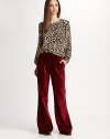 Pure silk crewneck in a luxe leopard print. Crewneck Long sleeves Silk Dry clean Made in USA of imported fabric