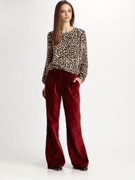 Pure silk crewneck in a luxe leopard print. Crewneck Long sleeves Silk Dry clean Made in USA of imported fabric