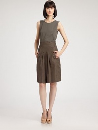 This two-tone cotton design features crisp, stitched-down front pleats on the skirt.Jewel necklineSleevelessBust dartsBanded waist with elastic backSide slash pocketsPleated skirt frontConcealed back zipAbout 24 from natural waist95% cotton/5% elastaneDry cleanImported of Swiss fabricModel shown is 5'9 (175cm) wearing US size 4. 