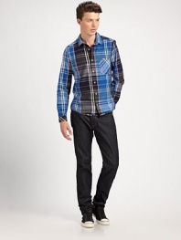 This slim-fitting silhouette comes alive in a bold plaid pattern.Button-frontChest patch pocketAbout 32 from shoulder to hemCottonMachine washImported