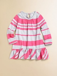 Spirited stripes on soft knit, simply styled with a straight shape and a feminine wide ruffle at the hem.Scoop neckline with center gathersLong sleevesStraight shapeKeyhole button back closeRuffled hem50% cotton/50% micro modalMachine washImported