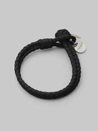Fine leather, artfully woven into a rope design that wraps the wrist with rich character. Available in Small and Medium. Woven leather Medallion detail Small length, about 7½ Medium length, about 9 Knot and loop closure Made in Italy