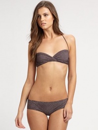 This pretty style features a contrast, die-cut design for a unique look. Tie-halterRuched, bandeau topMetal back clasp closureBikini bottom72% nylon/28% elastaneHand washMade in Italy