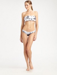 Ruffles upon romantic ruffles are the only way to go this season.Bandeau topBack tie closureFully lined92% polyester/8% elastaneHand washImported Please note: Bikini bottom sold separately. 
