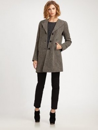 Classic wool style features a lengthy, textured tweed silhouette. Extended point collar Button front Slash pockets Long sleeves Fully lined About 33 from natural waist Wool Dry clean Imported Model shown is 5'9½ (176cm) wearing US size 4.