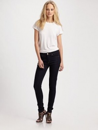 Super-skinny dark-rinse denim hugs the body in all the right places.THE FITMid rise Skinny leg Inseam, about 29THE DETAILSZip fly Button closure Five-pocket style 37% rayon/37% cotton/24.5% tencel/1.5% lycra Machine wash Made in USA of imported fabric