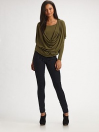 Soft jersey drapes beautifully around the body in a double-layered cowlneck silhouette.Scoopneck Cowlneck overlay Dropped shoulders Short sleeves over long About 22 from shoulder to hem Rayon Dry clean Made in USA