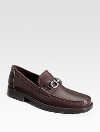 A classic leather loafer, expertly constructed in Italy from premium leather with a silvertone accent and signature lug sole. Leather lining Padded insole Rubber sole Made in Italy