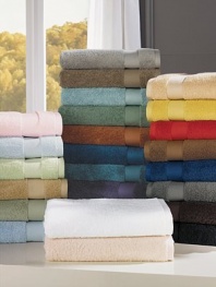 Indulge in the plush softness of pure combed cotton from Belgium, offering superior absorbency, a wide honeycomb dobby and rich, long-lasting color.59L X 28W Cotton Machine wash Imported