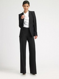 Smooth stretch wool pants with wide, straight legs.Wide waistband with hook-and-eye Belt loops Flat front with zip closure Inseam, about 35 96% virgin wool/4% elastane Dry clean Imported