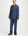 Incredibly cozy, lounge in style in fine cotton pajamas with classic stripe pattern. Machine wash. Imported.SHIRTButtonfrontSpread collarChest, waist patch pocketsPANTSFlat-front styleAdjustable two-button waistNo flyInseam, about 31