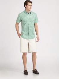 Trim-fitting short-sleeve style rendered in youthful gingham, with contrast trim on the collar and placket.Point collar Button front Contrast tab at back collarShort sleevesCottonMachine washImported