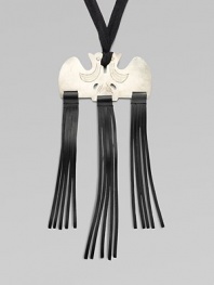 A statement piece if ever there was one, a rustic, etched metal plate on a sateen twill cord dangles three clusters of fringed buffalo leather in this head-turning design.Metal Leather Cotton sateen Length, about 28 Drop, about 6 Adjustable ties Imported