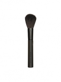 An essential accessory to any makeup wardrobe, the blush brush is designed with tapered bristles that allow you to dust on the perfect amount of makeup. Leaves a beautifully even, polished finish. Rounded edges caress the complexion with softness. 