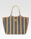 Classic striped burlap crafted with a roomy interior, leather trim and signature woven handles.Double top handles, 8¼ dropMagnetic top closureOne inside zip pocketTwo inside open pocketsCanvas lining15W X 13½H X 5¾DImported