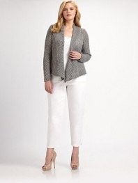 Cozy cable knit meets a chic design in a luxe wool blend. Open-front styleLong sleevesAbout 23 from shoulder to hem55% wool/27% viscose/18% alpacaHand washMade in USA