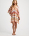 A delicately designed coverup with gorgeous colors and details.ScoopneckDolman sleevesRayonHand washMade in Italy