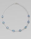 From the Scultura Collection. The pretty pastel shade of blue topaz shines through in silver-framed cabochon shapes spaced along a delicate chain.Blue topazSterling silverLength, about 18Lobster claspImported