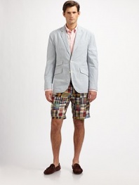 Light-as-air seersucker cotton lends preppy sensibility to a handsome sportcoat, cut in a trim, modern silhouette for impeccable style.ButtonfrontChest welt, waist flap pocketsRear ventAbout 30¼ from shoulder to hemCottonDry cleanImported