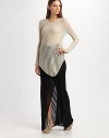 Gossamer wool-blend in an airy chevron knit dips to a point at front hem.Banded round neckline Long sleeves Asymmetrical hem About 36½ long 88% wool/12% nylon Dry clean Imported