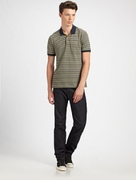 Finely striped classic polo finished with contrast trim on the collar and cuffs.Two-button placketLogo appliquéCottonMachine washImported
