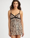 Explore your exotic side with this silky-smooth babydoll in a mixed animal print. V necklineSolid contrast trimAdjustable spaghetti strapsAbout 80 from shoulder to hem90% viscose/10% elastaneHand washMade in Italy