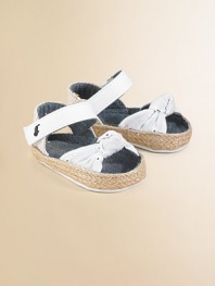 A sweet pair of stylish, eyelet-detailed espadrilles for your little fashionista with an ankle strap and grip-tape closure.Hook-and-loop strap with grip-tape closureCanvas upperCotton liningCanvas solePadded insoleImported