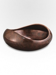 A beautiful bowl handcrafted in gleaming, bronze-finish alloy fits in seamlessly with any decor, from ultra-sleek modern to classic traditionalist. From the Heritage Pebble CollectionAntique copper-plated alloy10 diam.Wipe cleanImported