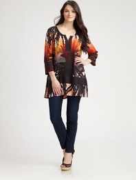 An intoxicating tropical print lends a laid-back quality to this design featuring a relaxed fit. Split necklineThree-quarter sleevesSolid trimSide slitsAbout 34 from shoulder to hem95% silk/5% elastaneDry cleanImported