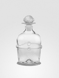 A beautiful, mouthblown glass silhouette defined by stunning berry and thread detail. A stunning addition to a home bar or a thoughtful gift for family and friend alike. Includes airtight stopper 40-ounce capacity 9 high Hand wash Imported 