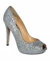 Sexy shimmer. The Humbie platform pump from Badgley Mischka takes your party style to new heights with a high heel and allover glittery sparkle.