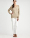 An alluring knit with a relaxed-yet-flattering fit and intriguing cable trim. ScoopneckLong sleevesAbout 25 from shoulder to hem62% linen/38% cottonMachine washImported