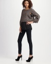 Soft, nubby knit, closely cropped with wide dolman sleeves.Boatneck Ribbed trim Pullover style About 18 from shoulder to hem 50% polyacrylic/40% wool/10% mohair Dry clean Imported