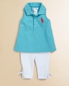 This adorable set features a classic polo and stretch leggings with lace-up ties along the ankles.Ribbed polo collarSleeveless with ribbed arm openingsFront buttonsRacerback-styleEmbroidered pony logoUneven side-vented hemElastic waistbandTop: CottonLegging: 93% cotton/7% elastaneMachine washImported Please note: Number of buttons/snaps may vary depending on size ordered 