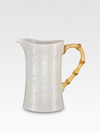 An elegant, sculptural and incredibly versatile pitcher is crafted in ceramic stoneware and finished with handpainted detail. From the Classic Bamboo Collection 2-qt. capacity 9H X 6 diam. Dishwasher safe Imported 