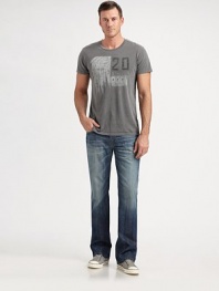 A slim-fitting classic with bootcut legs in medium-washed denim, lightly faded at the points of wear for the look of a longtime favorite. Five-pocket style Inseam, about 34 Cotton Machine wash Imported 