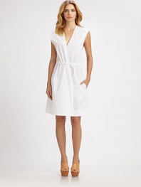 Breezy and beautiful with delicate drawstring details, rendered in crisp cotton poplin.Surplice necklineDrawstring shouldersSleevelessDrawstring waistBack pleatsAbout 22½ from natural waistCottonDry cleanImported