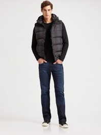 Warmth when you need it, atop a sweater or under a jacket, in a smart tonal plaid with the added amenity of a chill-chasing hood.Attached hood Front zipper under snap placket Angled front zip pockets Elasticized hem Nylon Machine wash Imported
