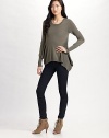 A new angle on knits, with billowy ribbed side panels and a knit-on-the-bias fit.Scoopneck pullover Long sleeves Rib knit side panels About 29 long Wool; dry clean Imported