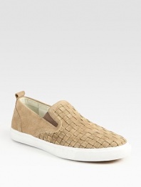 Sport around town in style in this delicately woven slip-on of rich, supple suede and contrasting rubber sole.< Leather liningPadded insoleRubber soleImported