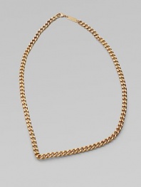 It looks like a simple chain but this clever non-flexible design fools the eye with its fixed V shape and an extra non-working clasp.Brass Length, about 15 Lobster clasp Made in Italy