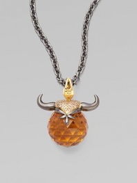 A goldplated and black rhodium plated sterling silver bull horns, complete with pavé cubic zirconia, looms over a topaz crystal, strung on a long elegant chain.Topaz crystal Cubic zirconia Goldplated sterling silver Black rhodium plated sterling silver Chain length, about 30 Pendant width, about 1½ Lobster clasp Imported