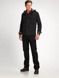 In black-washed denim with a classic fit, a modern jean for the modern man.Zip flyButton closureBelt loopsFive-pocket styleComfortable fit through hip and thighInseam, about 34CottonMachine washImported