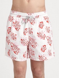 A brilliant turtle print adorns these quick-dry trunks, complete with drawstring waist and back eyelets to avoid a ballooning effect.Drawstring elastic waistBack flap pocket with grip-tape closureMesh liningPolyamideMachine washImported