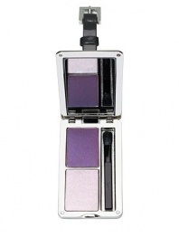 Directly inspired from the luggage tag of YSL handbags, this limited edition collector make-up palette contains one harmony of two eyeshadow shades: a deep purple and a silvery lavendar. The palette contains an applicator for a precise make up result. With matte and bright silver contrasts and an engraved cover, this fashion accessory can be attached to handbag, belt, or even a key ring. 4½H X 1¾W X ¾L 