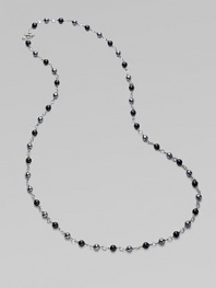 From the Bijoux Collection. A long elegant sterling silver strand of black onyx and hematite beads.Black onyx, hematite Sterling silver Length, about 40 Toggle closure Imported