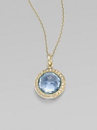 From the Lollipop Collection. A beautifully colored faceted blue topaz, framed in diamonds, hangs from a graceful 18k gold chain. Blue topaz Diamonds, 0.14 tcw 18k yellow gold Chain length, about 16 with 2 extender Pendant diameter, about ½ Spring ring clasp Imported