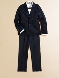 Turn your little man into the man of the hour in this essential classic with stitched trim, a notched collar and button cuffs.Notched collarLong sleeves with functional three-button cuffsSingle-breasted button frontChest pocket and front flap pocketsDouble vented backCottonDry cleanImported